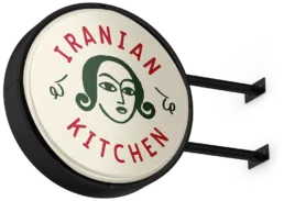 KUKU Iranian Kitchen &ndash; rundt facadeskilt med logo designet af Comugraph.